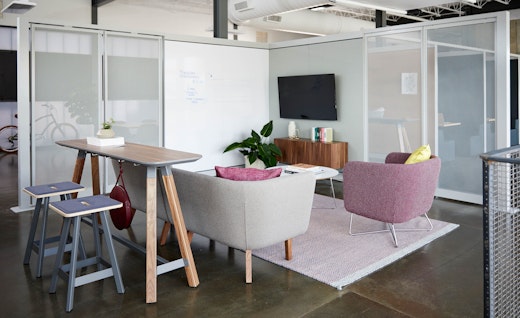 rockwell unscripted creative wall perforated steel pivot fins fixed fins team meeting lounge tall table drink rail easy stools modular lounge sofa club chair wire base occasional table coffee table credenza tv monitor markerboard muuto ply rug 